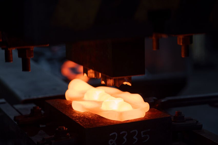 Closeup of a platter in a forge press