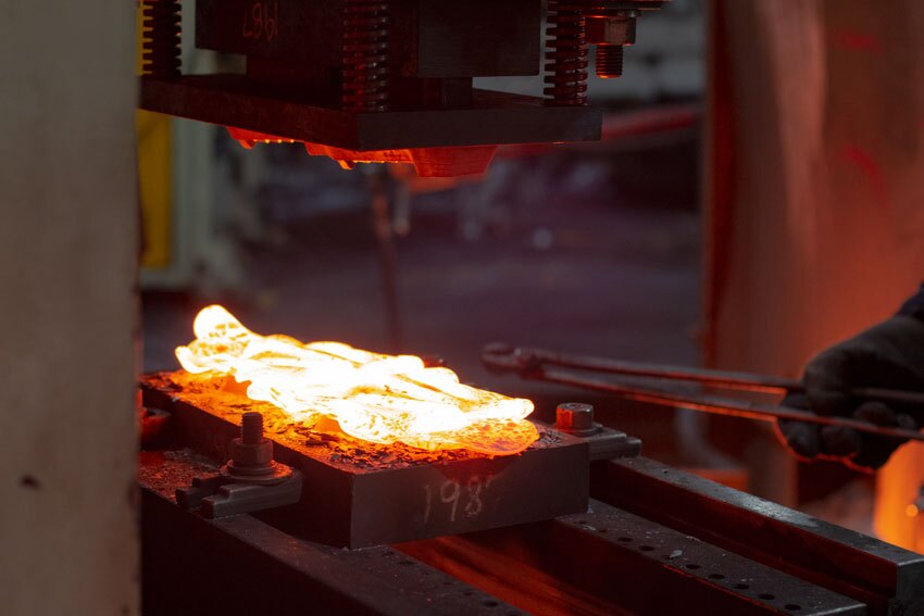 Forging in a trim press