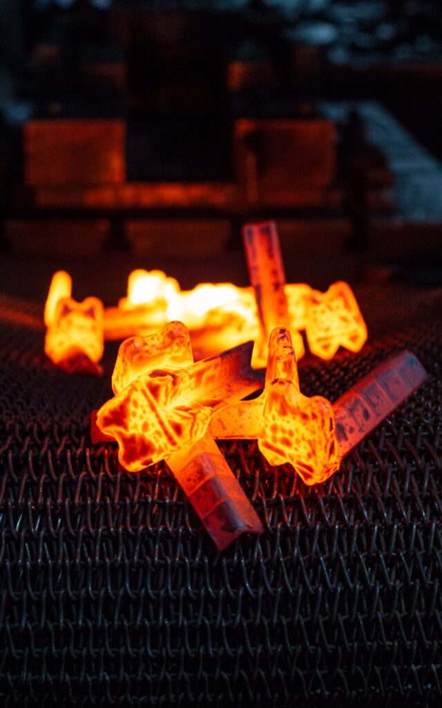 Glowing metal parts, recently forged