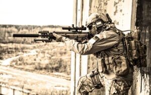 Soldier aiming a rifle