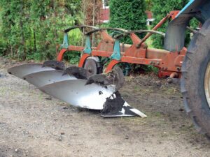 A plow with three furrows